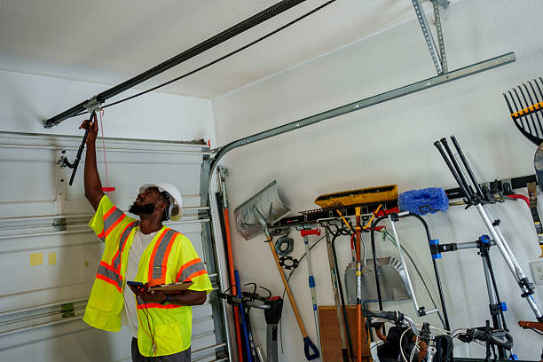 Professional Garage Door Panel Replacement technician working in Charlotte, MI